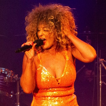 Julie Nevada as Tina Turner